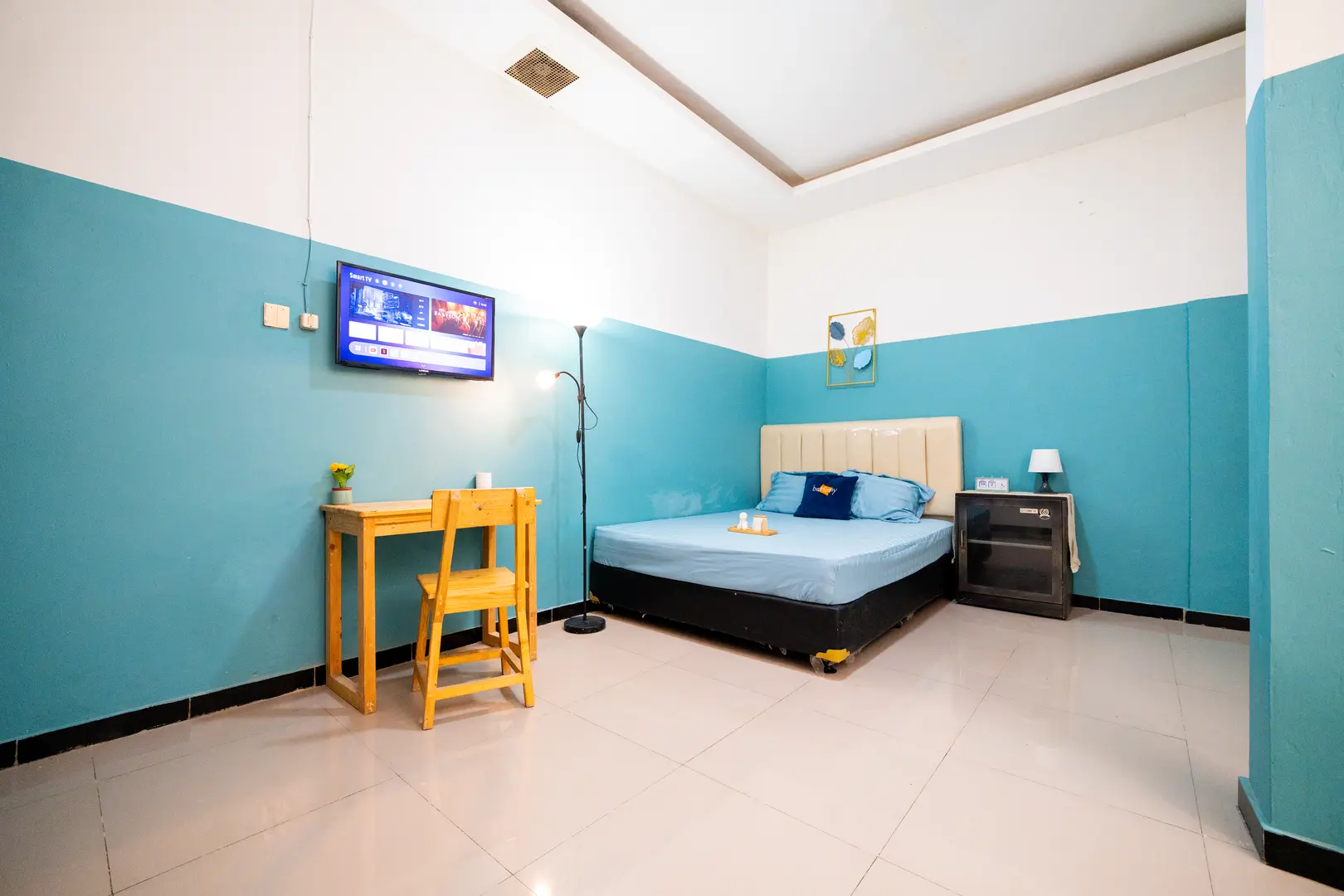 foto kamar Tipe Deluxe properti Behomy Yume Grogol