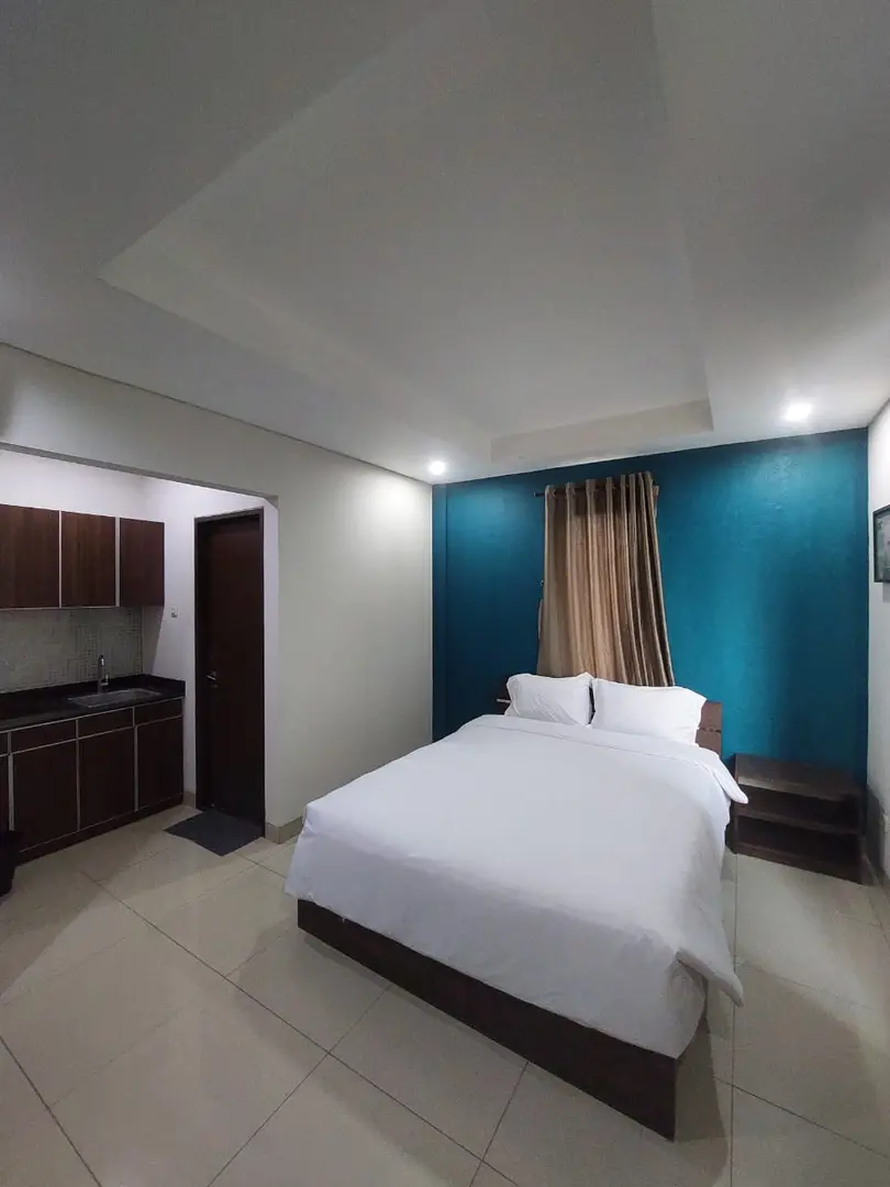 foto kamar Tipe Deluxe properti Behomy Corner Eight