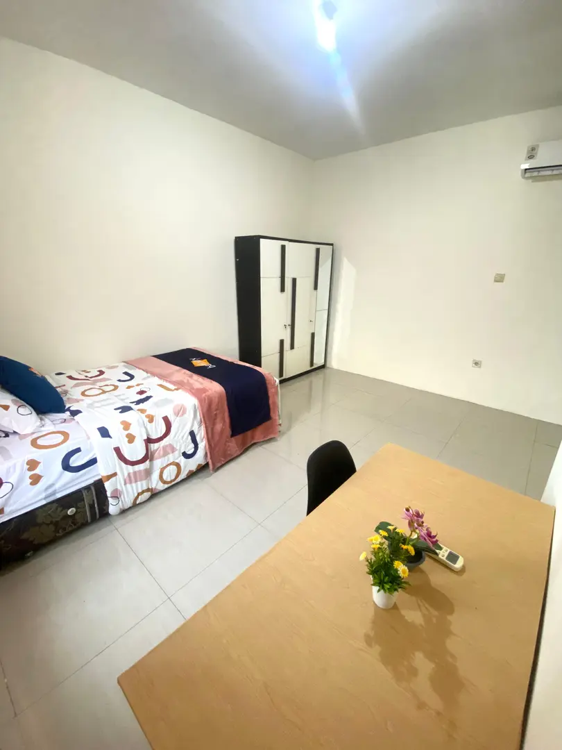 foto kamar Tipe Premium properti Behomy E12 Siwalankerto