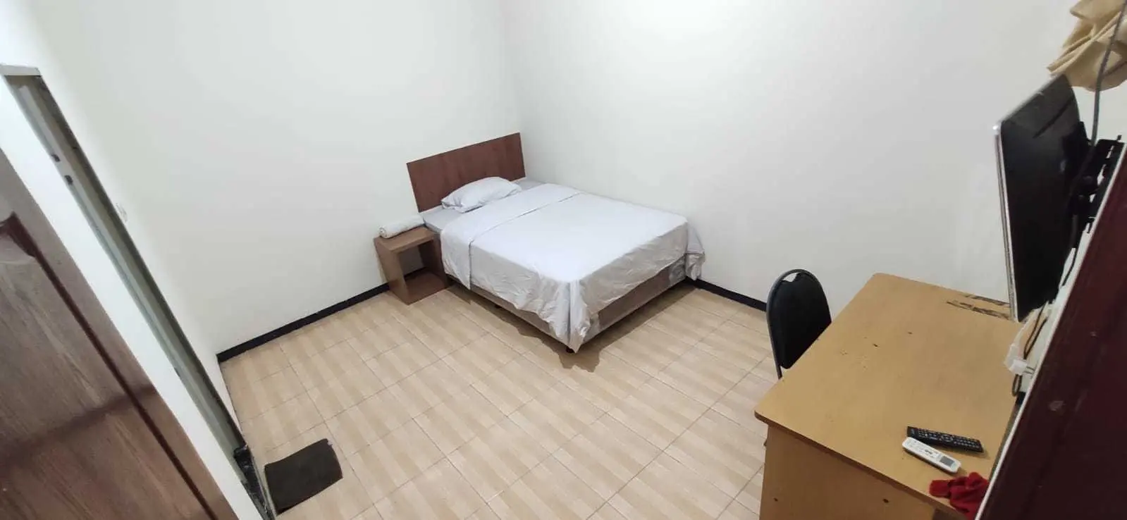 foto kamar Tipe Standar properti Behomy Cozynest AA4