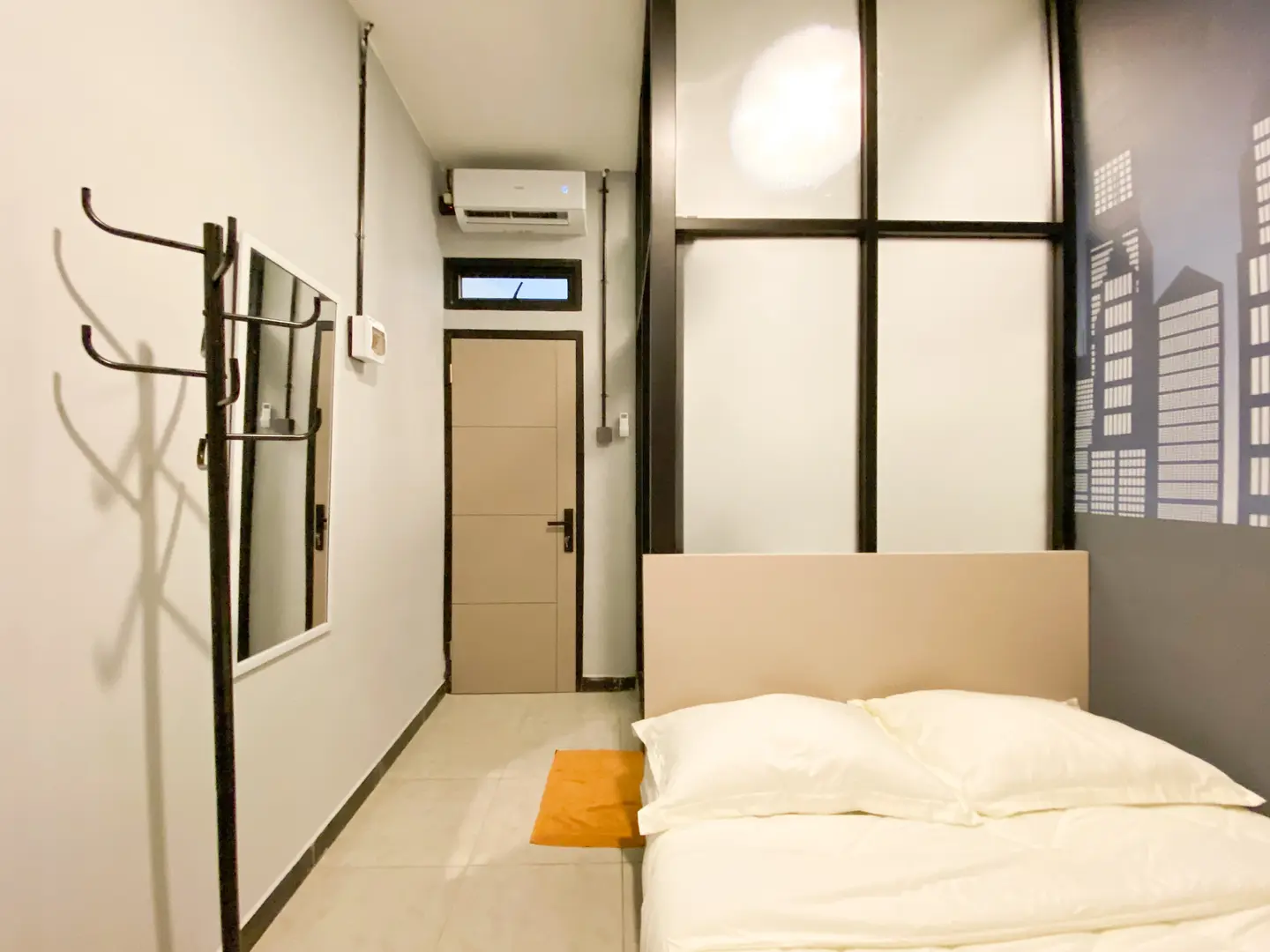 foto kamar Tipe Standar properti Behomy Urban Suite Bekasi