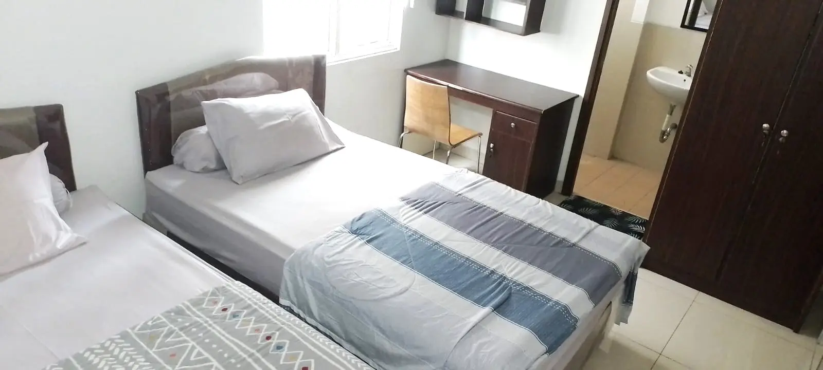 foto kamar Tipe Twin Bed properti Behomy Lincoln 23